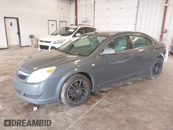 2009 Saturn Aura XE with VIN 1G8ZS57B69F214615, listed as a IAAI auction lot 43260082 with 162,180 mi miles and . Bid and sale history available at DreamBid. Image 2.