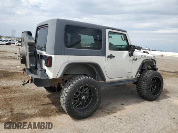 2008 Jeep Wrangler X с VIN 1J4FA24118L627350, выставлен на аукционе Copart как лот 82374345 с пробегом 217 748 миль миль и Списание • Salvage title. История ставок и продаж доступна на DreamBid. Изображение 3.