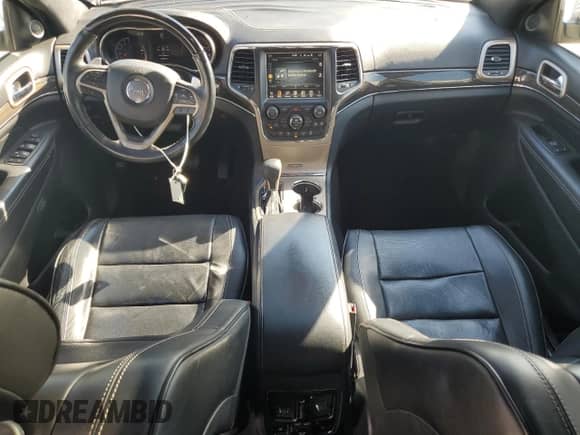 2017 Jeep Grand Cherokee Overland with VIN 1C4RJECGXHC916964, listed as a Copart auction lot 80358275 with 169,868 mi miles and Salvage title. Bid and sale history available at DreamBid. Image 8.
