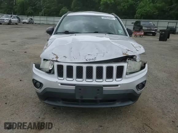 2011 Jeep Compass Latitude z VIN 1J4NT1FB8BD192270, wystawiony jako Copart lot #54953485 z przebiegiem 128 094 mil mil oraz Szkoda całkowita • Salvage title. Historia ofert i sprzedaży dostępna na DreamBid. Obrazek 14.