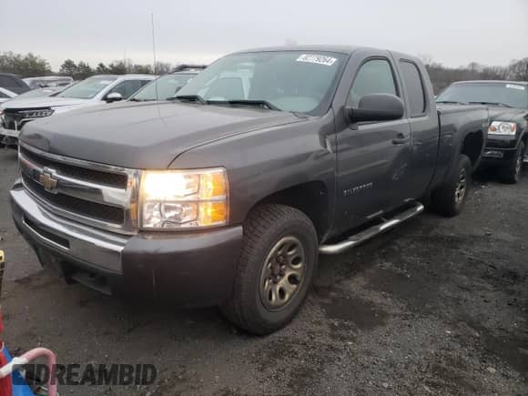 2010 Chevrolet Silverado 1500 Work Truck with VIN 1GCSKPE38AZ266054, listed as a Copart auction lot 82779264 with 154,528 mi miles and Salvage title. Bid and sale history available at DreamBid. Image 1.