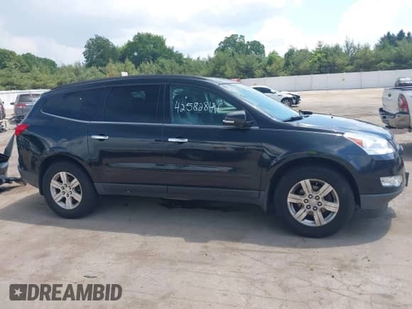 2012 Chevrolet Traverse 2LT with VIN 1GNKVJED6CJ330498, listed as a IAAI auction lot 42582844 with 131,057 mi miles and . Bid and sale history available at DreamBid. Image 13.