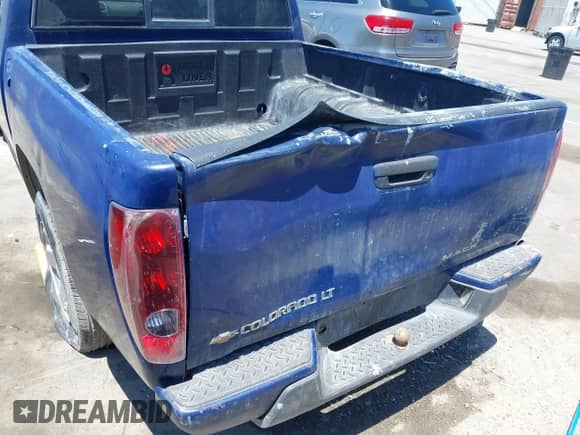 2010 Chevrolet Colorado 1LT z VIN 1GCDSCD93A8121274, wystawiony jako IAAI lot #42386168 z przebiegiem Nie podano mil oraz . Historia ofert i sprzedaży dostępna na DreamBid. Obrazek 6.