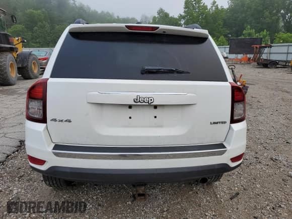 2014 Jeep Compass Limited z VIN 1C4NJDCB3ED500919, wystawiony jako Copart lot #63126535 z przebiegiem 99 312 mil mil oraz Szkoda całkowita • Salvage title. Historia ofert i sprzedaży dostępna na DreamBid. Obrazek 6.