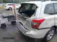 2014 Subaru Forester Touring z VIN JF2SJAPC7EH536627, wystawiony jako IAAI lot #42862912 z przebiegiem 114 727 mil mil oraz . Historia ofert i sprzedaży dostępna na DreamBid. Obrazek 6.