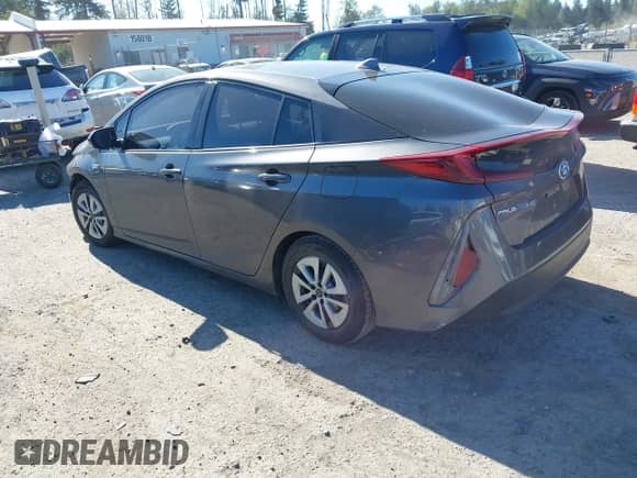 2018 Toyota Prius Plus z VIN JTDKARFP1J3071500, wystawiony jako IAAI lot #42665651 z przebiegiem 168 014 mil mil oraz . Historia ofert i sprzedaży dostępna na DreamBid. Obrazek 3.