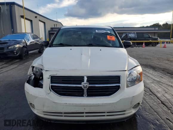 2010 Dodge Caliber Mainstreet с VIN 1B3CB3HA3AD566929, выставлен на аукционе Copart как лот 86334135 с пробегом 96 125 миль миль и Списание • Salvage title. История ставок и продаж доступна на DreamBid. Изображение 5.