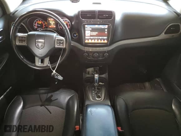 2016 Dodge Journey Crossroad with VIN 3C4PDDGG9GT118428, listed as a Copart auction lot 71531815 with 190,327 mi miles and Salvage title. Bid and sale history available at DreamBid. Image 8.