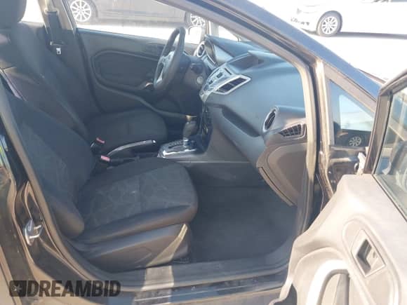 2011 Ford Fiesta SE z VIN 3FADP4BJ7BM108874, wystawiony jako IAAI lot #43137504 z przebiegiem 144 354 mil mil oraz . Historia ofert i sprzedaży dostępna na DreamBid. Obrazek 5.