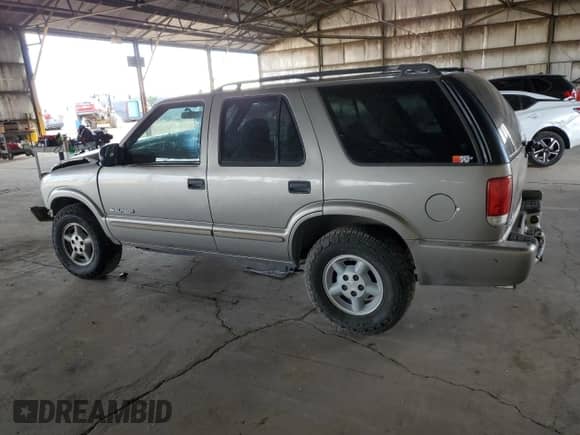 2004 Chevrolet Blazer LS z VIN 1GNDT13X84K120850, wystawiony jako Copart lot #72561234 z przebiegiem 188 094 mil mil oraz Szkoda całkowita • Salvage title. Historia ofert i sprzedaży dostępna na DreamBid. Obrazek 2.