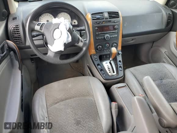 2007 Saturn VUE V6 z VIN 5GZCZ53447S812509, wystawiony jako Copart lot #70159725 z przebiegiem 226 863 mil mil oraz Szkoda całkowita • Salvage title. Historia ofert i sprzedaży dostępna na DreamBid. Obrazek 8.