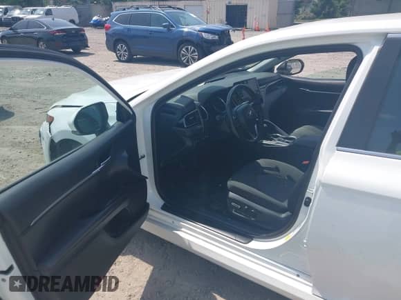 2022 Toyota Camry Hybrid LE with VIN 4T1C31AK2NU591549, listed as a IAAI auction lot 42499072 with 55,882 mi miles and . Bid and sale history available at DreamBid. Image 5.