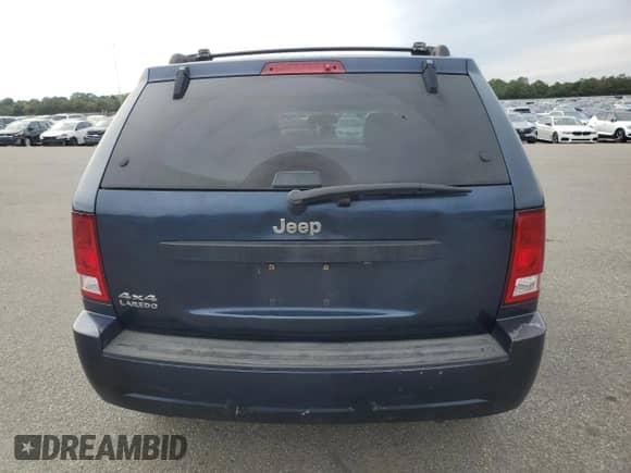 2009 Jeep Grand Cherokee Laredo with VIN 1J8GR48K29C516625, listed as a Copart auction lot 84273115 with 170,159 mi miles and Salvage title. Bid and sale history available at DreamBid. Image 6.