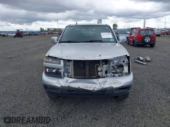 2010 Chevrolet Colorado 1LT z VIN 1GCJTCDEXA8114061, wystawiony jako IAAI lot #42235820 z przebiegiem 218 972 mil mil oraz . Historia ofert i sprzedaży dostępna na DreamBid. Obrazek 13.