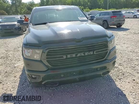 2021 Ram 1500 Big Horn z VIN 1C6RREFT0MN768878, wystawiony jako Copart lot #66859775 z przebiegiem 108 714 mil mil oraz Szkoda całkowita • Salvage title. Historia ofert i sprzedaży dostępna na DreamBid. Obrazek 13.