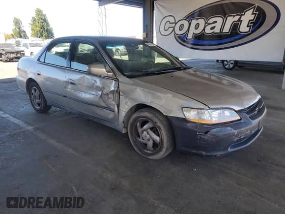 1999 Honda Accord LX z VIN JHMCG6654XC023089, wystawiony jako Copart lot #69421625 z przebiegiem 259 495 mil mil oraz Szkoda całkowita • Salvage title. Historia ofert i sprzedaży dostępna na DreamBid. Obrazek 4.