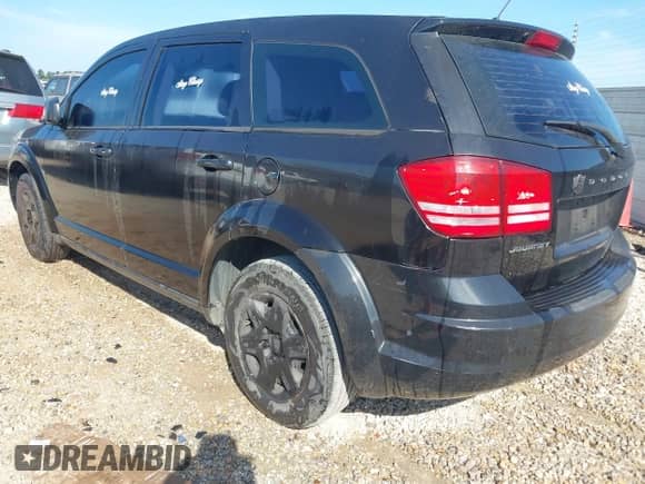 2012 Dodge Journey American Value z VIN 3C4PDCAB2CT296554, wystawiony jako IAAI lot #42711875 z przebiegiem 193 921 mil mil oraz . Historia ofert i sprzedaży dostępna na DreamBid. Obrazek 3.