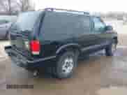 2002 Chevrolet Blazer LS z VIN 1GNDT13W92K170614, wystawiony jako IAAI lot #41745723 z przebiegiem 119 571 mil mil oraz . Historia ofert i sprzedaży dostępna na DreamBid. Obrazek 4.