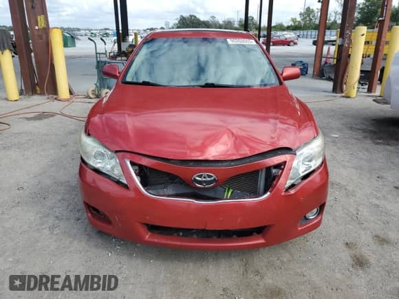 2011 Toyota Camry LE с VIN 4T1BK3EK5BU613480, выставлен на аукционе Copart как лот 90260065 с пробегом 129 615 миль миль и Списание • Salvage title. История ставок и продаж доступна на DreamBid. Изображение 5.