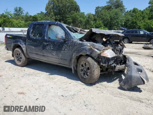 2021 Nissan Frontier Pro-4X with VIN 1N6ED0EB7MN712208, listed as a Copart auction lot 61527345 with Not provided miles and Salvage title. Bid and sale history available at DreamBid. Image 4.