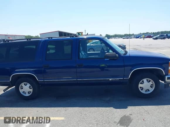 1997 Chevrolet Suburban z VIN 3GNEC16R8VG111155, wystawiony jako IAAI lot #42634153 z przebiegiem 282 812 mil mil oraz . Historia ofert i sprzedaży dostępna na DreamBid. Obrazek 13.