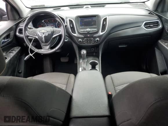 2020 Chevrolet Equinox LT с VIN 2GNAXUEV9L6185826, выставлен на аукционе Copart как лот 64212785 с пробегом Не указан миль и Списание • Salvage title. История ставок и продаж доступна на DreamBid. Изображение 8.