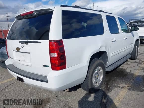 2010 Chevrolet Suburban LT z VIN 1GNUCJE05AR210539, wystawiony jako IAAI lot #41805107 z przebiegiem 166 305 mil mil oraz . Historia ofert i sprzedaży dostępna na DreamBid. Obrazek 4.