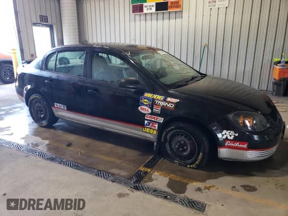 2005 Chevrolet Cobalt with VIN 1G1AK52F157555611, listed as a Copart auction lot 71554565 with 156,488 mi miles and Salvage title. Bid and sale history available at DreamBid. Image 4.