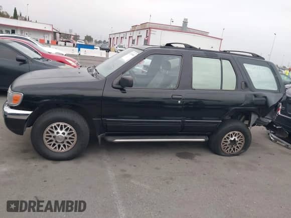 1997 Nissan Pathfinder XE with VIN JN8AR05S6VW191274, listed as a IAAI auction lot 42495088 with 294,683 mi miles and . Bid and sale history available at DreamBid. Image 14.