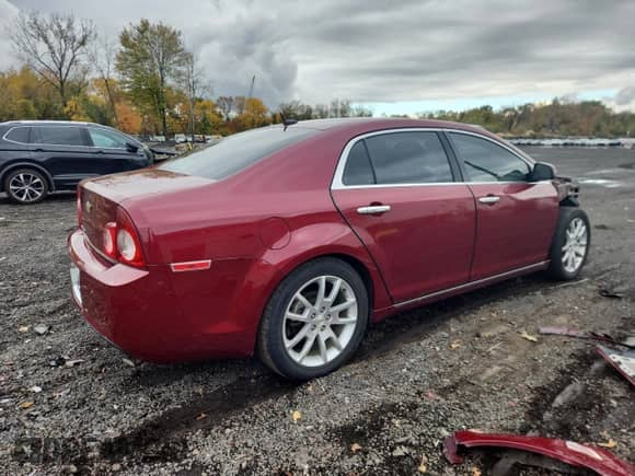 2011 Chevrolet Malibu LTZ with VIN 1G1ZE5E14BF298262, listed as a Copart auction lot 87244995 with 124,236 mi miles and Salvage title. Bid and sale history available at DreamBid. Image 3.