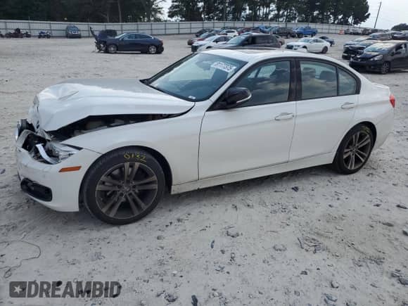 2014 BMW 3 Series 328i xDrive with VIN WBA3B3C55EJ978749, listed as a Copart auction lot 81177375 with 97,928 mi miles and Salvage title. Bid and sale history available at DreamBid. Image 1.