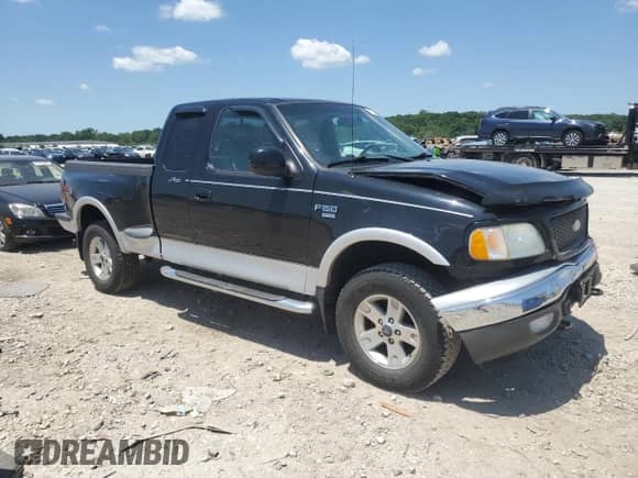 2003 Ford F-150 XL с VIN 1FTRX08L23KD52703, выставлен на аукционе Copart как лот 61762655 с пробегом 180 860 миль миль и Чистый • Clean title. История ставок и продаж доступна на DreamBid. Изображение 4.