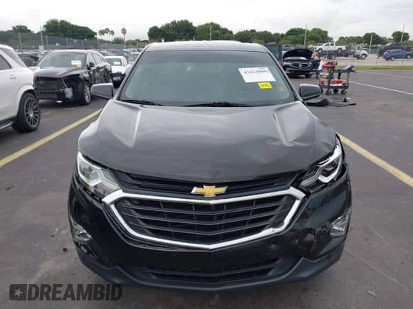 2019 Chevrolet Equinox LT z VIN 3GNAXKEV4KL223820, wystawiony jako IAAI lot #43423889 z przebiegiem 60 241 mil mil oraz . Historia ofert i sprzedaży dostępna na DreamBid. Obrazek 12.