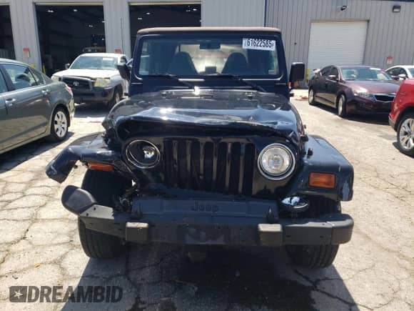 1999 Jeep Wrangler Sahara с VIN 1J4FY49S6XP432277, выставлен на аукционе Copart как лот 61622585 с пробегом 113 390 миль миль и Списание • Salvage title. История ставок и продаж доступна на DreamBid. Изображение 5.