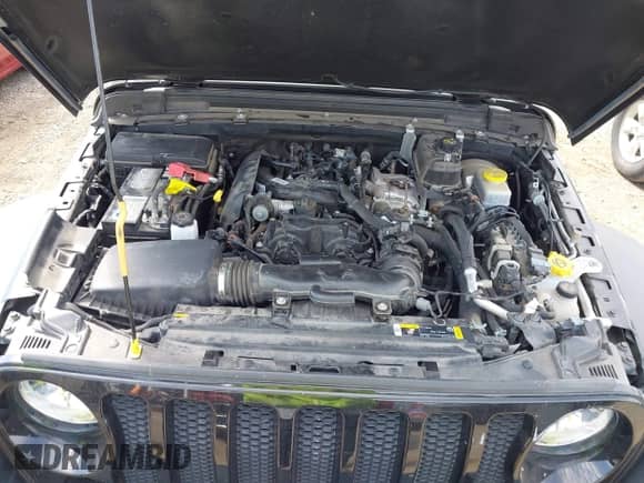 2023 Jeep Wrangler Sport S with VIN 1C4HJXDN6PW599895, listed as a IAAI auction lot 42242107 with 53,980 mi miles and . Bid and sale history available at DreamBid. Image 10.