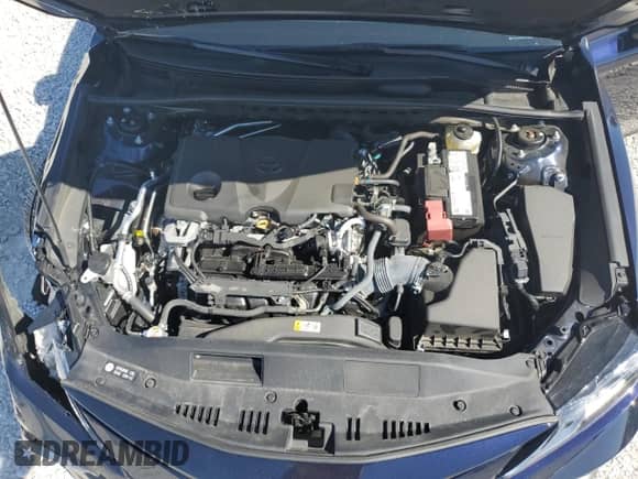 2021 Toyota Camry LE z VIN 4T1R11AK9MU449164, wystawiony jako Copart lot #84798495 z przebiegiem 15 811 mil mil oraz Szkoda całkowita • Salvage title. Historia ofert i sprzedaży dostępna na DreamBid. Obrazek 11.