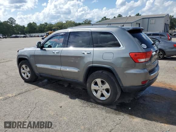 2012 Jeep Grand Cherokee Limited z VIN 1C4RJEBG7CC276299, wystawiony jako Copart lot #64085755 z przebiegiem 86 272 mil mil oraz Szkoda całkowita • Salvage title. Historia ofert i sprzedaży dostępna na DreamBid. Obrazek 2.
