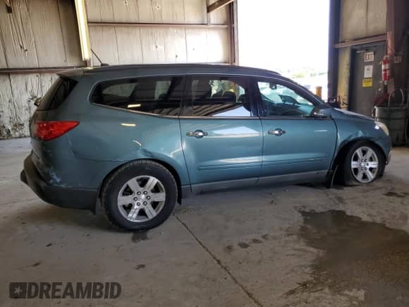 2009 Chevrolet Traverse 2LT with VIN 1GNER23D59S156193, listed as a Copart auction lot 65038475 with 138,864 mi miles and Salvage title. Bid and sale history available at DreamBid. Image 3.