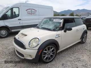 2009 MINI Hardtop S with VIN WMWMF73569TW87347, listed as a Copart auction lot 59445035 with 118,336 mi miles and Salvage title. Bid and sale history available at DreamBid. Image 1.