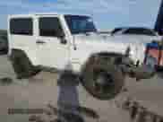 2012 Jeep Wrangler Sahara z VIN 1C4GJWBG2CL176351, wystawiony jako Copart lot #83831724 z przebiegiem 161 675 mil mil oraz Szkoda całkowita • Salvage title. Historia ofert i sprzedaży dostępna na DreamBid. Obrazek 4.