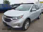 2018 Chevrolet Equinox LT with VIN 2GNAXJEV4J6285778, listed as a IAAI auction lot 43275955 with 84,159 mi miles and . Bid and sale history available at DreamBid. Image 2.