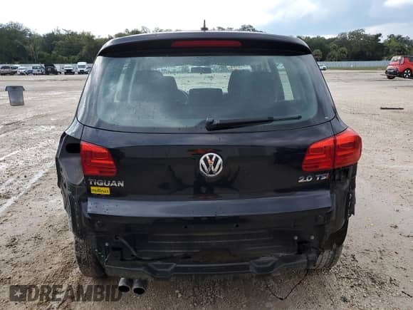2014 Volkswagen Tiguan with VIN WVGCV3AX4EW526613, listed as a Copart auction lot 73949784 with 83,421 mi miles and Salvage title. Bid and sale history available at DreamBid. Image 6.