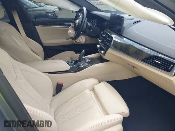 2023 BMW 5 Series 530e with VIN WBA13AG07PCN20158, listed as a IAAI auction lot 42146666 with 31,619 mi miles and . Bid and sale history available at DreamBid. Image 5.