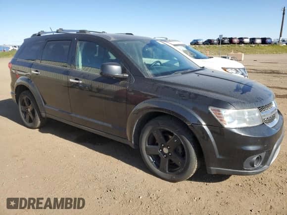 2012 Dodge Journey R/T with VIN 3C4PDDFG4CT334487, listed as a Copart auction lot 84225095 with 209,450 mi miles and Clean title. Bid and sale history available at DreamBid. Image 4.