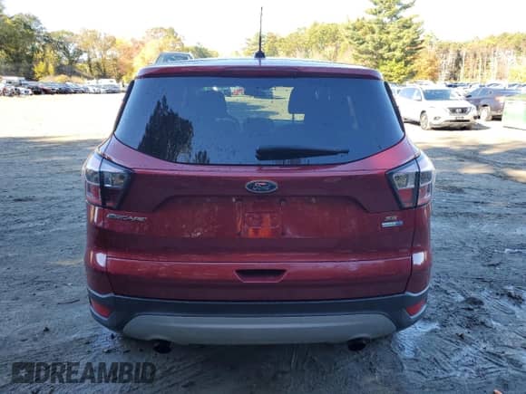 2017 Ford Escape SE с VIN 1FMCU9GD7HUC71197, выставлен на аукционе Copart как лот 86788225 с пробегом 105 399 миль миль и Чистый • Clean title. История ставок и продаж доступна на DreamBid. Изображение 6.