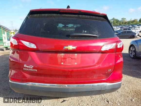 2018 Chevrolet Equinox LT with VIN 2GNAXJEV1J6243052, listed as a IAAI auction lot 43152605 with 124,859 mi miles and . Bid and sale history available at DreamBid. Image 16.