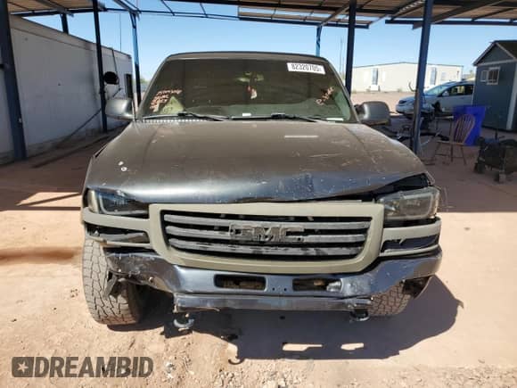 2003 GMC Sierra 1500 SLE z VIN 2GTEC19V831300489, wystawiony jako Copart lot #82320705 z przebiegiem 146 528 mil mil oraz Szkoda całkowita • Salvage title. Historia ofert i sprzedaży dostępna na DreamBid. Obrazek 5.