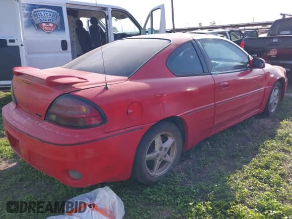 2001 Pontiac Grand Am GT z VIN 1G2NW12E51M542292, wystawiony jako IAAI lot #41971237 z przebiegiem Nie podano mil oraz . Historia ofert i sprzedaży dostępna na DreamBid. Obrazek 4.