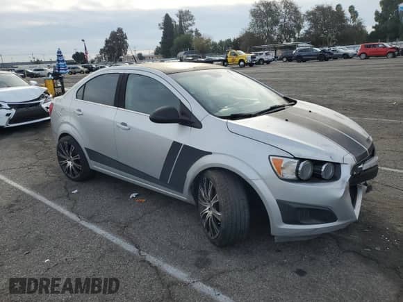 2012 Chevrolet Sonic LT z VIN 1G1JD5SB5C4180537, wystawiony jako Copart lot #86329704 z przebiegiem 134 506 mil mil oraz Szkoda całkowita • Salvage title. Historia ofert i sprzedaży dostępna na DreamBid. Obrazek 4.