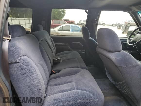 1995 Chevrolet Suburban с VIN 1GNGK26NXSJ321118, выставлен на аукционе Copart как лот 58260485 с пробегом 145 262 миль миль и Списание • Salvage title. История ставок и продаж доступна на DreamBid. Изображение 11.